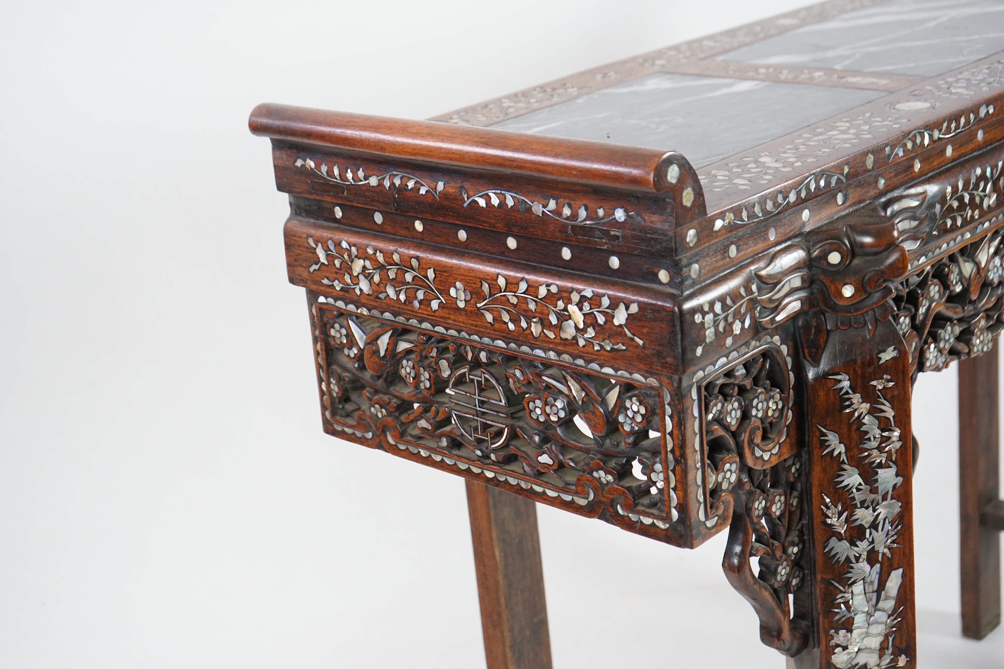 A good Chinese mother-of-pearl inlaid and marble topped hongmu altar table, late 19th/early 20th century